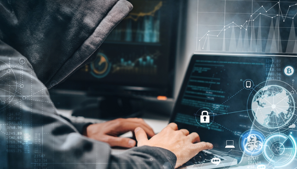 Cyber criminal hacking into a computer causing a data breach.|Cyber criminal hacking into a laptop causing a data security breach.